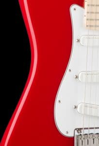 The striking racecar-inspired Torino Red body gleams under the spotlights with a smooth N.O.S. (New Old Stock) finish. The maple neck and fingerboard, 3-ply W/B/W pickguard and chrome hardware contrast beautifully with the deep red of the body.